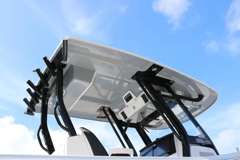 Slide: The Image of 2026 Sea Fox 288 Commander boat top view against blue sky. - 6