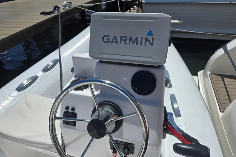 Slide: The Image of Steering console of 2023 AB 11 VSX boat with Garmin navigation system. - 4