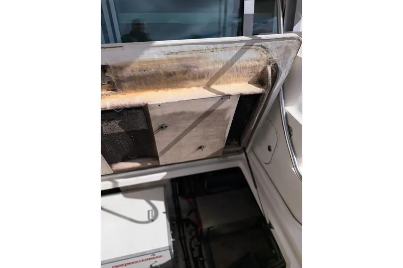 Slide: The Image of 1999 Maxum 4600 SCB engine compartment with open hatch, showing interior components. - 41