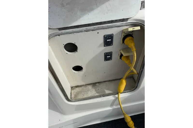 Slide: The Image of Electrical panel with yellow cables on a 1999 Maxum 4600 SCB boat. - 6