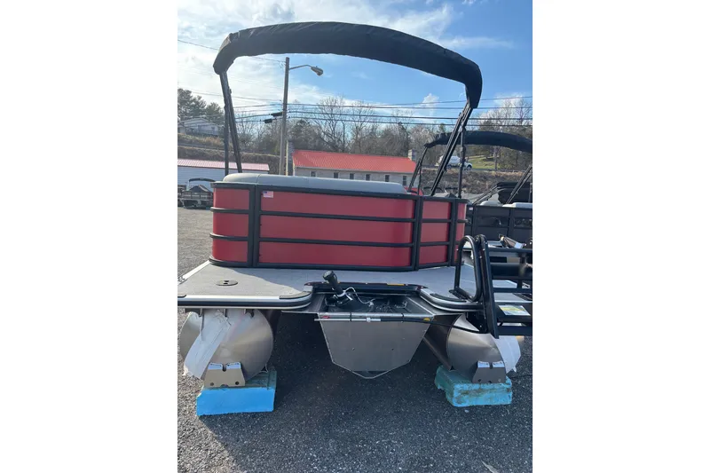 Slide: The Image of 2026 Bentley Pontoons Legacy 220 Cruise XL, red exterior, parked outdoors. - 8