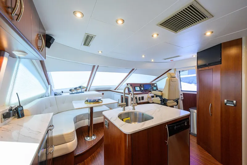 Slide: The Image of Luxurious interior of 2005 Lazzara 68 Enclosed Bridge yacht with modern amenities. - 42