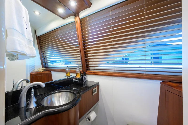 Slide: The Image of Luxurious bathroom interior of 2005 Lazzara 68 Enclosed Bridge yacht with modern fixtures. - 50