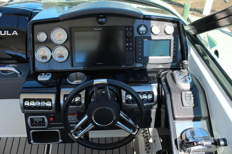 Slide: The Image of Dashboard of 2018 Formula 350 Crossover Bowrider with gauges and navigation system. - 15