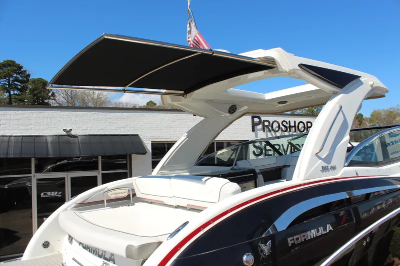 Slide: The Image of 2018 Formula 350 Crossover Bowrider with sleek design and retractable canopy. - 28