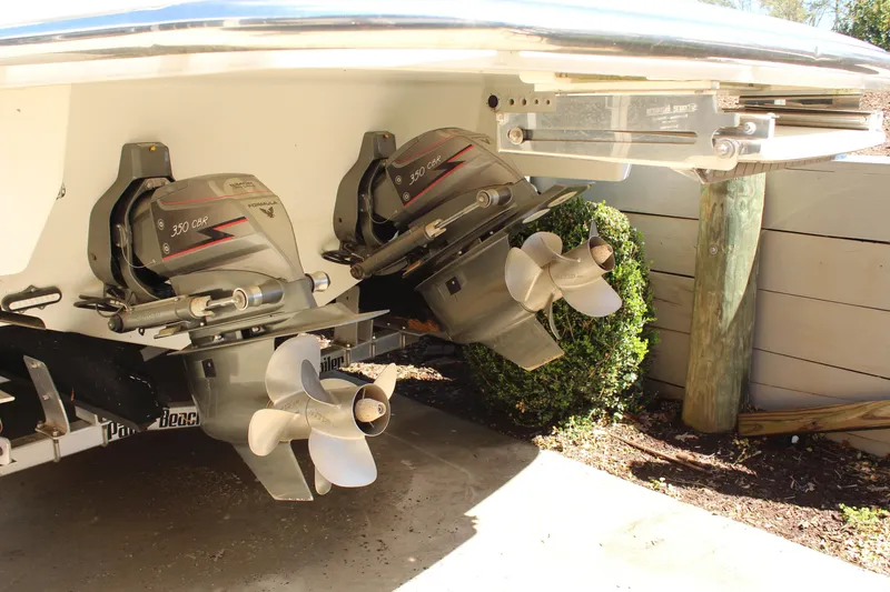 Slide: The Image of 2018 Formula 350 Crossover Bowrider dual propellers in a sunny outdoor setting. - 5