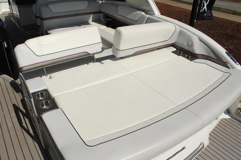 Slide: The Image of 2018 Formula 350 Crossover Bowrider with spacious white seating and cup holders. - 9