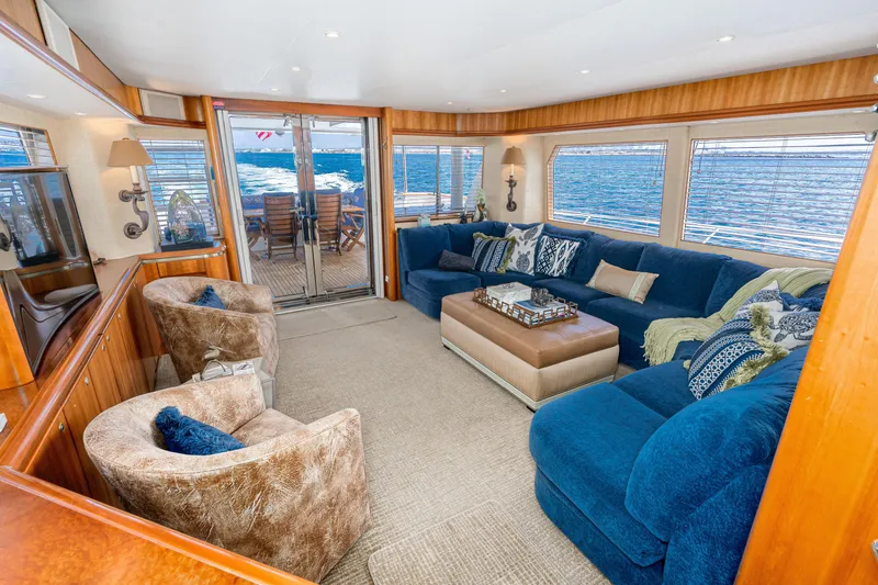 Slide: The Image of Luxurious 2001 West Bay Sonship yacht interior with plush seating and ocean view. - 18