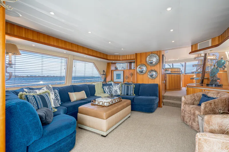 Slide: The Image of Luxurious interior of 2001 West Bay Sonship yacht with plush seating and elegant decor. - 19