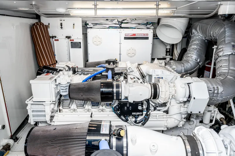Slide: The Image of Engine room of 2001 West Bay Sonship yacht, featuring advanced machinery and equipment. - 38