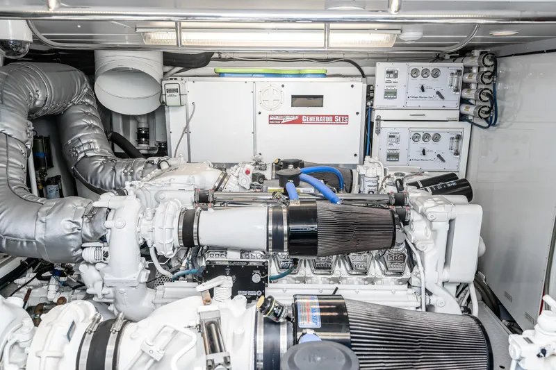 Slide: The Image of Engine room of 2001 West Bay Sonship yacht with generator and control panels. - 39