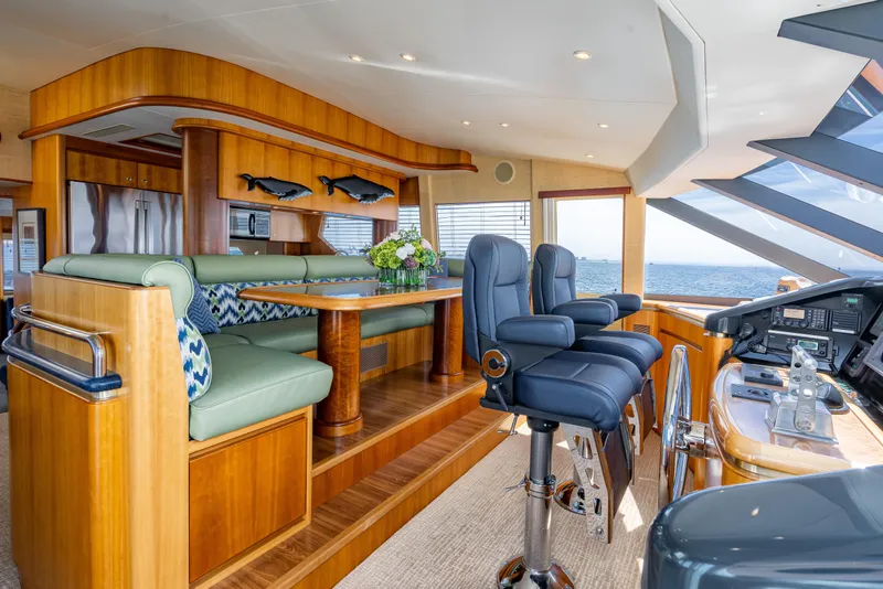 Slide: The Image of Luxurious 2001 West Bay Sonship yacht interior with elegant seating and ocean view. - 5