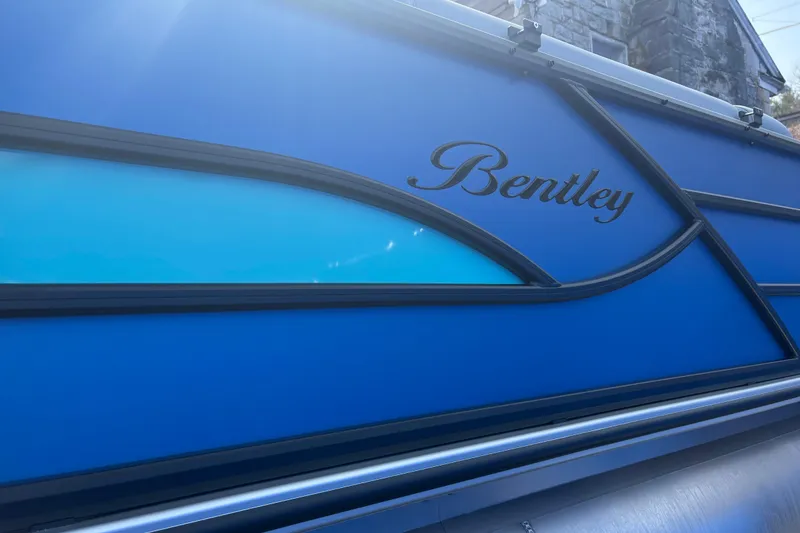 The Image of 2026 Bentley Pontoons Legacy 220 Cruise XL, blue exterior detail. - 0