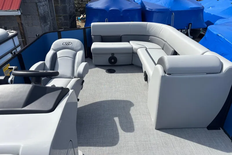 Slide: The Image of 2026 Bentley Pontoons Legacy 220 Cruise XL interior with luxurious seating and modern design. - 11