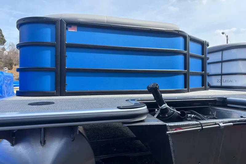 Slide: The Image of 2026 Bentley Pontoons Legacy 220 Cruise XL, blue exterior, docked, close-up view. - 12