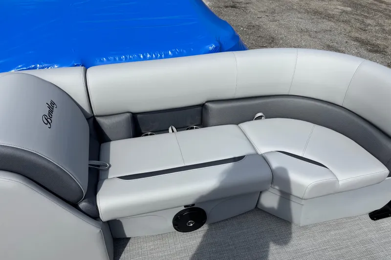 Slide: The Image of 2026 Bentley Pontoons Legacy 220 Cruise XL, luxurious seating detail with gray upholstery. - 14