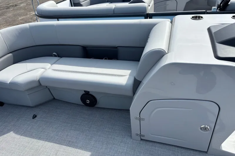 Slide: The Image of 2026 Bentley Pontoons Legacy 220 Cruise XL interior with sleek seating and storage. - 16
