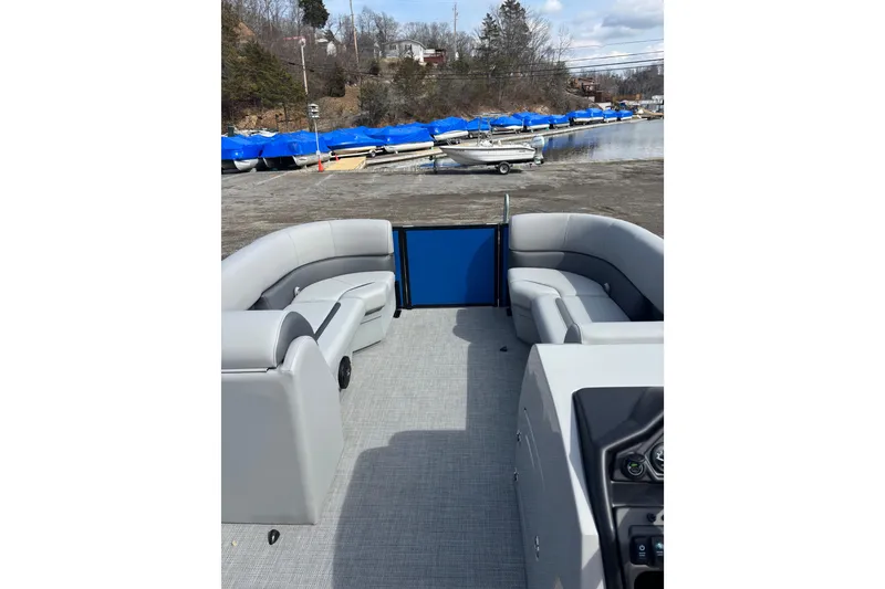 Slide: The Image of 2026 Bentley Pontoons Legacy 220 Cruise XL interior with gray seating and open deck. - 6