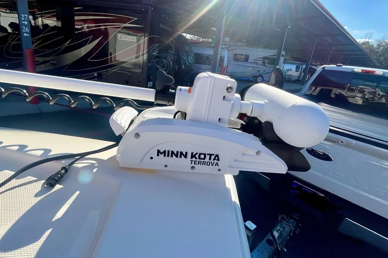 Slide: The Image of Minn Kota Terrova motor on 2018 SeaVee 270Z boat, parked in a marina. - 10