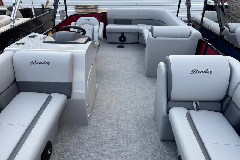 Slide: The Image of 2026 Bentley Pontoons Legacy 220 Cruise XL interior with luxurious seating and modern design. - 6