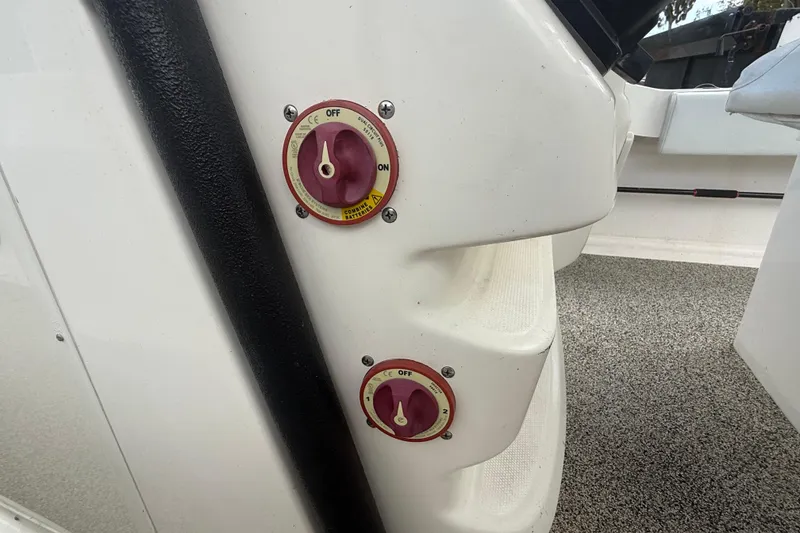 Slide: The Image of Battery switches on a 2022 Eastward 30 boat, featuring "Off" and "On" settings. - 103