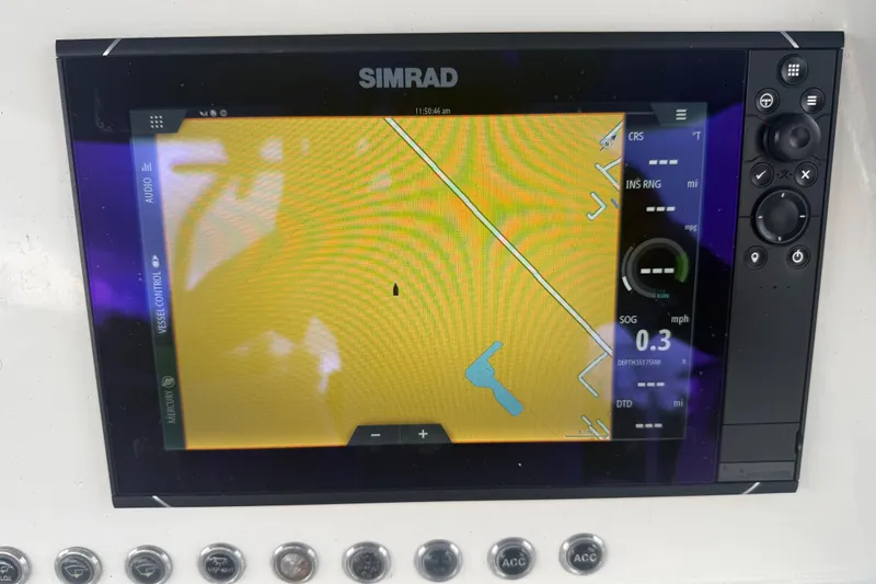 Slide: The Image of Simrad navigation display on 2022 Eastward 30 boat, showing map and controls. - 106