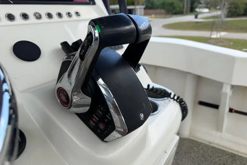 Slide: The Image of Boat throttle control on a 2022 Eastward 30 vessel dashboard. - 108