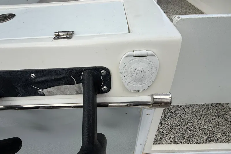 Slide: The Image of Boat interior detail of Eastward 30, 2022 model, featuring a white panel and handle. - 116