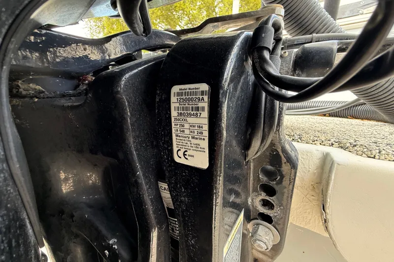 Slide: The Image of Close-up of a 2022 Eastward 30 engine label with serial number and specifications. - 124