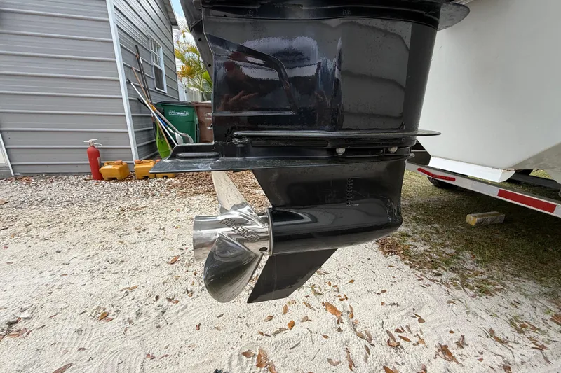 Slide: The Image of Outboard motor of 2022 Eastward 30 boat with stainless steel propeller. - 126