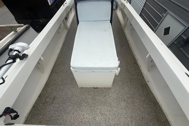 Slide: The Image of Interior view of 2022 Eastward 30 boat with seating and Garmin equipment. - 29