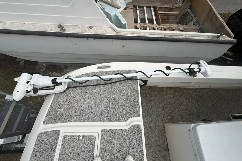 Slide: The Image of Overhead view of a 2022 Eastward 30 boat with mounted trolling motor. - 30