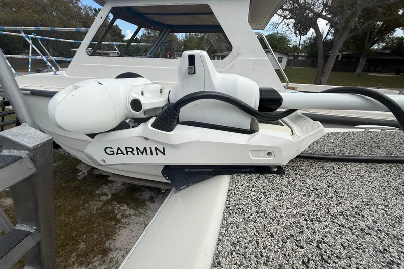 Slide: The Image of Eastward 30 boat with Garmin equipment, 2022 model, docked outdoors. - 31