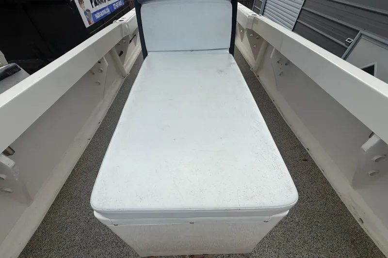 Slide: The Image of White seating area on a 2022 Eastward 30 boat deck. - 40