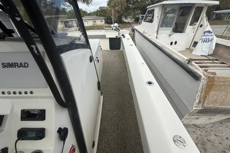 Slide: The Image of 2022 Eastward 30 boat interior with Simrad electronics and spacious deck. - 50