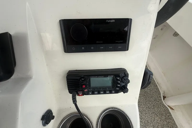 Slide: The Image of Control panel of 2022 Eastward 30 boat with radio and audio system. - 57