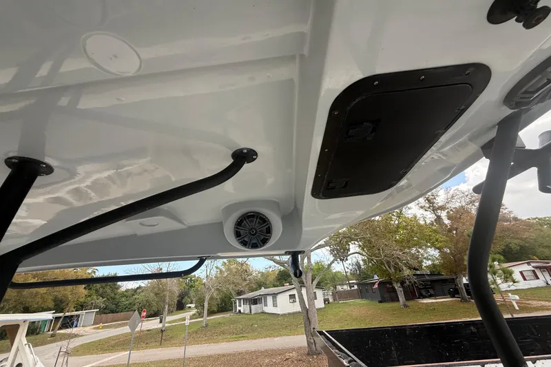 Slide: The Image of 2022 Eastward 30 boat interior with speaker and hatch, showcasing sleek design. - 68