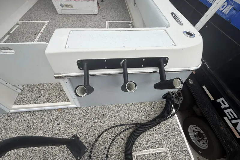 Slide: The Image of Boat interior with rod holders, Eastward 30 model, 2022, featuring non-slip flooring. - 84