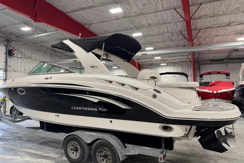 Slide: The Image of 2014 Chaparral 287 SSX boat on trailer in indoor storage facility. - 3