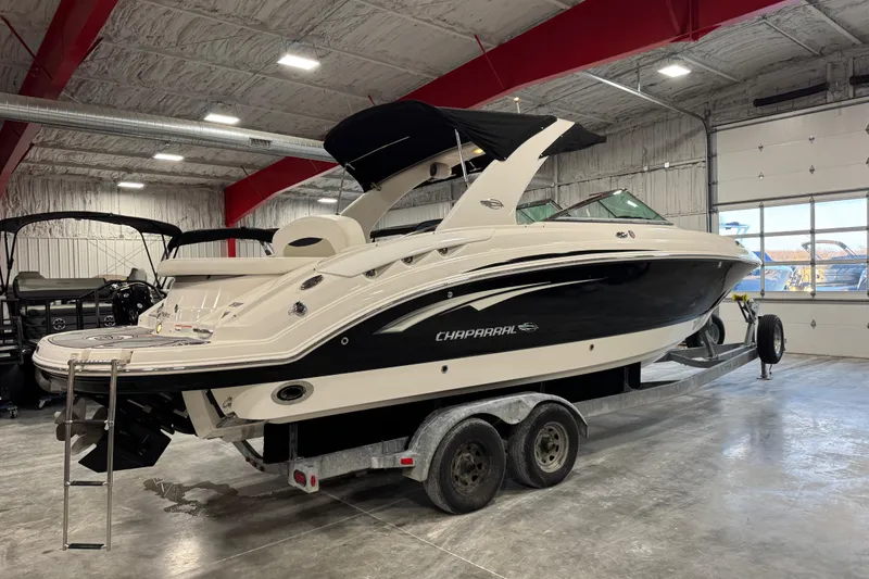 Slide: The Image of 2014 Chaparral 287 SSX boat on trailer in indoor showroom. - 4