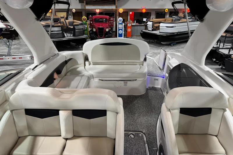 Slide: The Image of 2014 Chaparral 287 SSX boat interior with luxurious seating and modern design. - 9