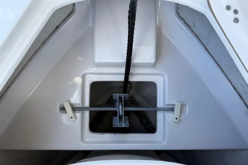 Slide: The Image of Anchor storage compartment of 2021 P Open 232 Center Console boat. - 19