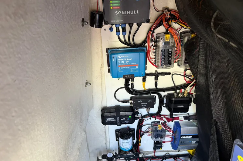Slide: The Image of Electrical system setup in a 2021 P Open 232 Center Console boat. - 29