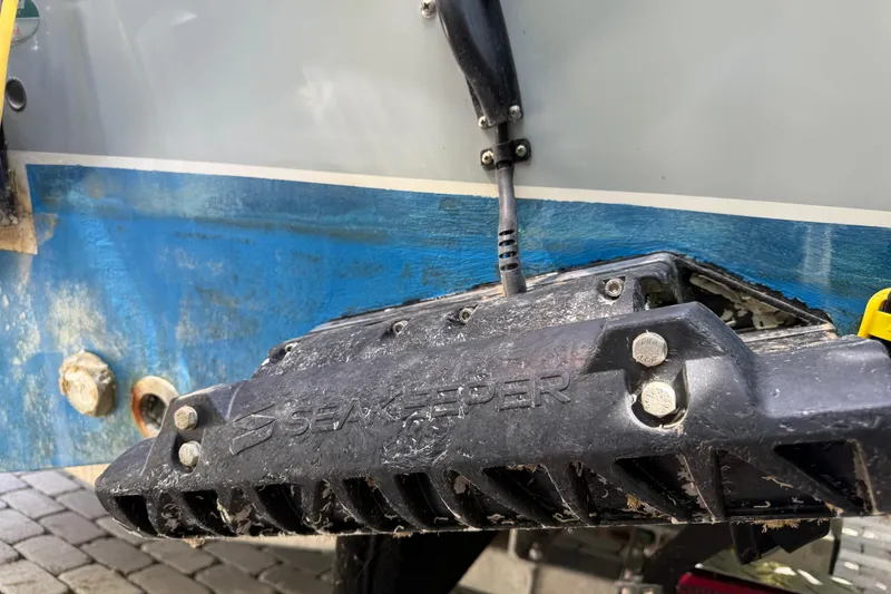 Slide: The Image of 2021 P Open 232 Center Console with Seakeeper stabilizer installed on the hull. - 3