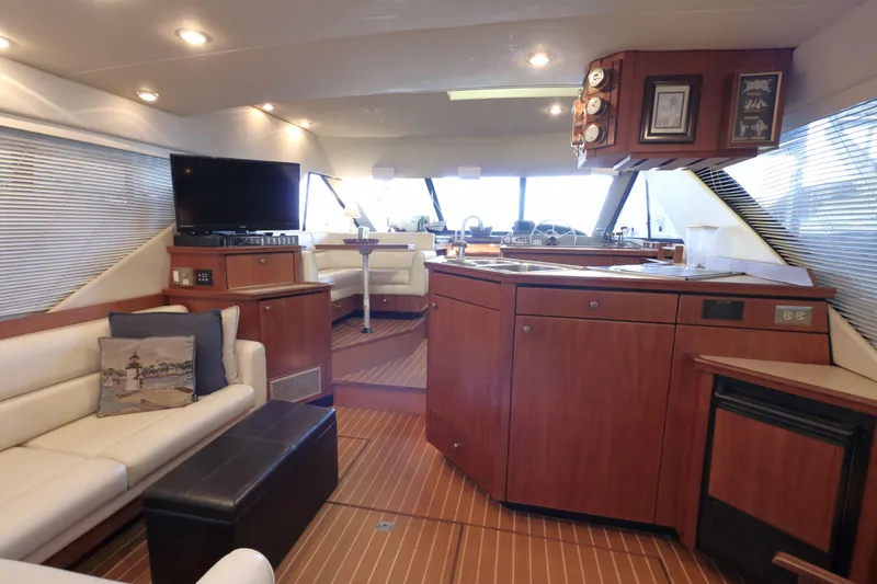 Slide: The Image of Luxurious interior of 1995 Bayliner 3988 Command Bridge Motoryacht with modern amenities. - 14