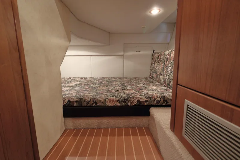 Slide: The Image of Interior cabin of 1995 Bayliner 3988 Command Bridge Motoryacht with floral upholstery. - 19