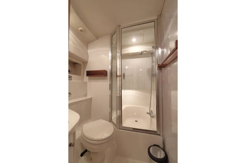 Slide: The Image of Bathroom interior of 1995 Bayliner 3988 Command Bridge Motoryacht with shower and toilet. - 23