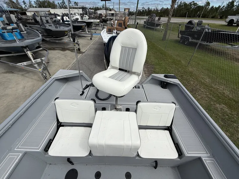 Slide: The Image of G3 Bay 20 boat 2026 with white seats outdoors. - 10
