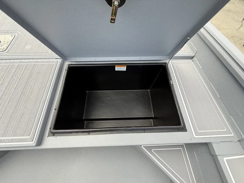 Slide: The Image of Open storage compartment in G3 Bay 20 boat, model 2026. - 4