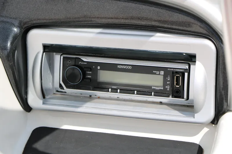 Slide: The Image of Kenwood stereo system in 2010 Tahoe Q7i boat dashboard. - 33